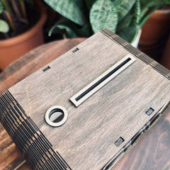 Child using piggy bank with cash counter