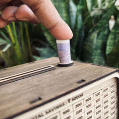 Piggy bank showing cash amount digitally