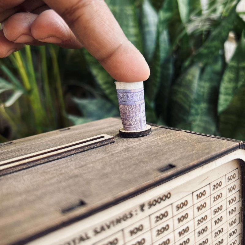 Piggy bank showing cash amount digitally